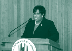 A picture of Merylin Jackson, executive director of the South Carolina State University-sponsored CDC, describing its threefold mission of teaching, research, and public service.