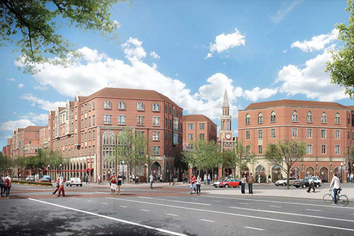 Rendered illustration of the southeastern corner of USC Village when completed, showing the block fronts of two streets as well as a major pedestrian way entering the block from the corner. Buildings in USC Village are four and five story mixed-use buildings made of brick with some pointed arch windows and other gothic details. A clock tower terminates the vista along the pedestrian way.