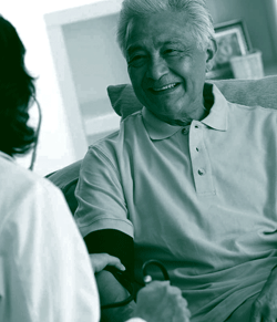 A picture of an elderly man able to age in place with the help of a service coordinator.
					  