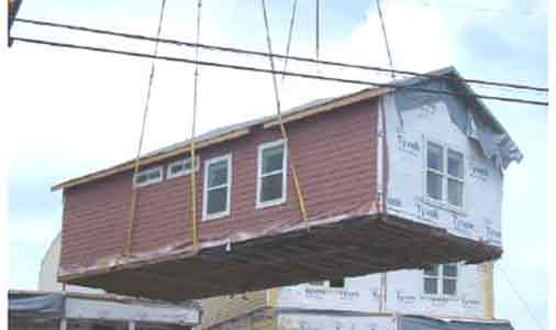 Crane installation of a HUD-Code home.