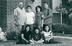 A picture of a typical family who has easier access to an affordable mortgage because of The Helping Families Save Their Homes Act of 2009. A picture of a typical family who has easier access to an affordable mortgage because of The Helping Families Save Their Homes Act of 2009.