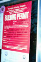 Close-up of red building permit