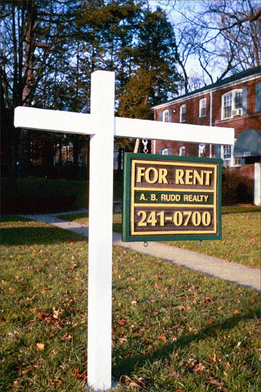 For-rent sign in front of apartment complex 
