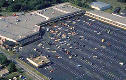  Aerial view of an office/retail complex parking lot.