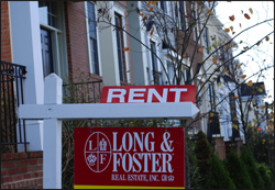 A picture of a rent sign.