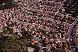 An aerial view of a conventional subdivision.  