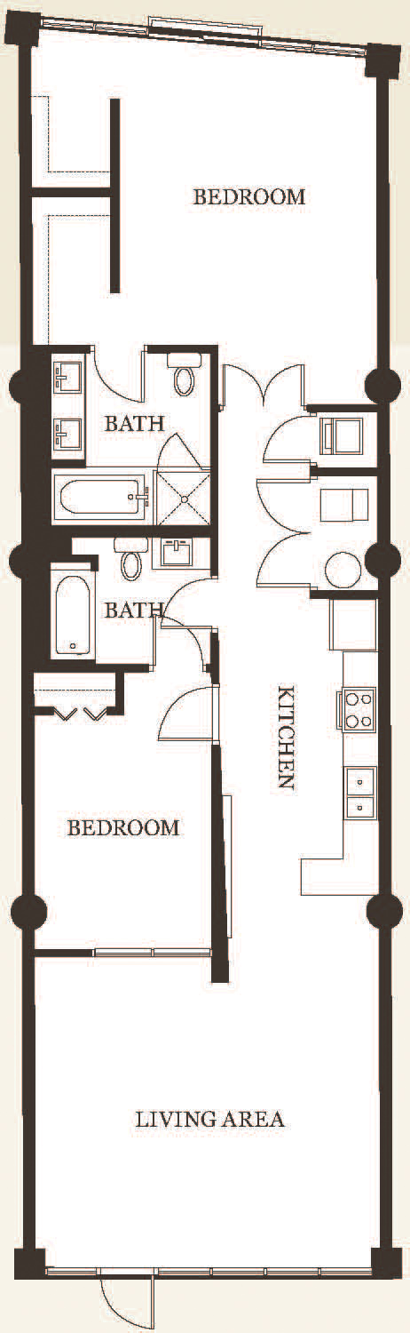 This is a floor plan of a two bedroom, two bath unit in The Lofts of Reynoldstown. The building is an adaptive reuse of what was once a motorcycle parts manufacturing company.